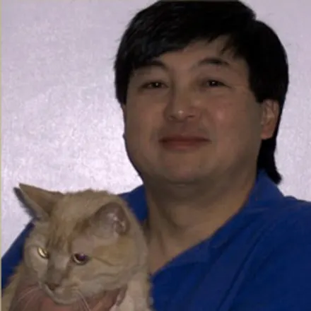 Terry Fujinami with tabby cat